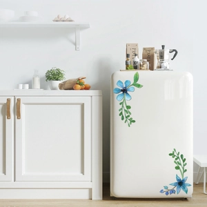 Floral watercolor PVC stickers with blue flowers on white refrigerator surface