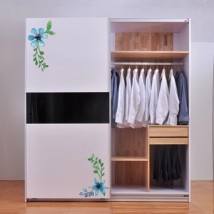 Detail of sliding wardrobe interior showing wooden grain shelves and clothing hanging area