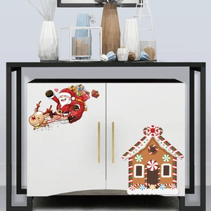 Detailed Christmas stickers of Santa on a reindeer sleigh and a colorful gingerbread house