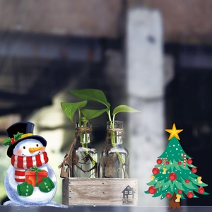 Detail of hydroponic glass vases with hemp rope in a wooden HOME base with green plants