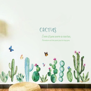 Detail of watercolor cactus wall stickers with colorful butterflies and CACTUS text