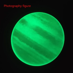 Detailed view of glow-in-the-dark planet wall sticker with green luminous Jupiter pattern