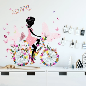Stickers muraux fille à vélo fleuri avec papillons roses et texte Love décoratif