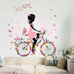 Stickers muraux chambre fille sur vélo à fleurs avec papillons et lettrage Love
