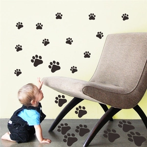Multicolor animal paw print wall stickers for home decor shown on wall and floor