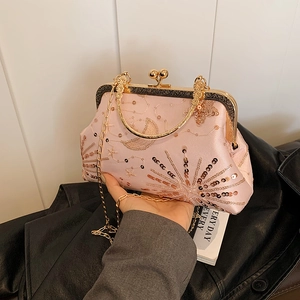 Pink sequin star and moon evening handbag with gold chain strap and ring handle