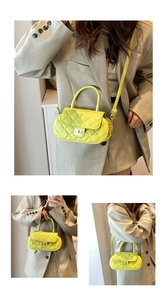 Detail of neon green quilted crossbody bag with metal twist lock and round handle