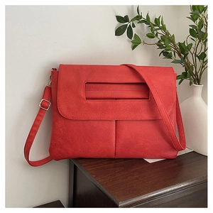 Red minimalist rectangular PU leather clutch and shoulder bag with cutout handle detail