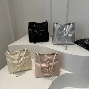 Minimalist tote bags with bow knot details in black, silver, beige and pink