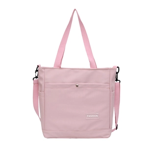 Grand sac cabas rose en toile avec étiquette fashion et bandoulière amovible