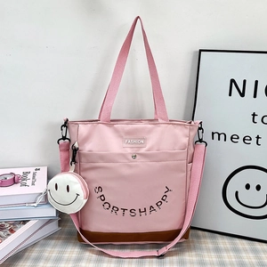 Grande borsa tote in nylon rosa per studenti con ciondolo smiley e logo fashion