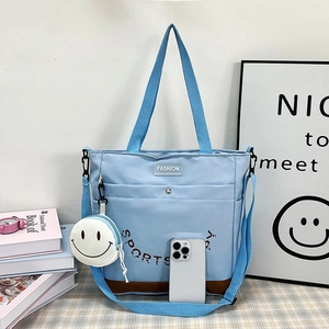 Borsa tote in tela celeste con tracolla regolabile e astuccio smiley per studenti