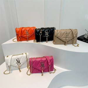 Quilted crossbody chain bags in five colors with metal tassels and SS gold logo details