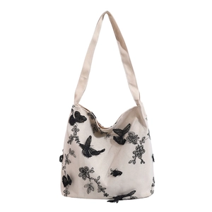 Beige canvas underarm tote bag with exquisite black butterfly and floral embroidery