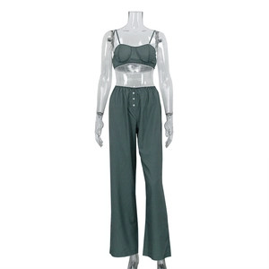 Striped two-piece set featuring a dark green camisole top and high-waist wide-leg pants
