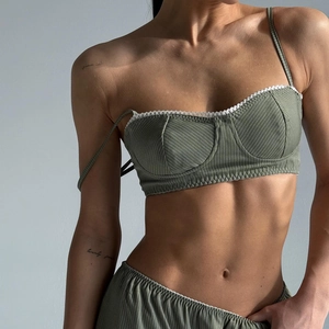 Olive green rib-knit two-piece lounge set with delicate white lace trim and high waist shorts