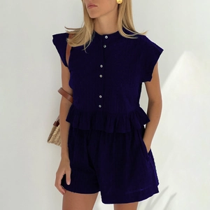 Women navy blue two-piece set with ruffle hem eyelet top and casual shorts