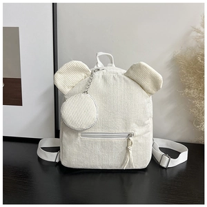Detail of off-white corduroy backpack with cute bear ears and small round coin purse