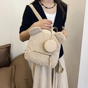Beige corduroy backpack with cute bear ears and round coin purse accessory for travel