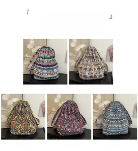 Detailed grid of five ethnic patterned drawstring backpacks with elephant and geometric prints