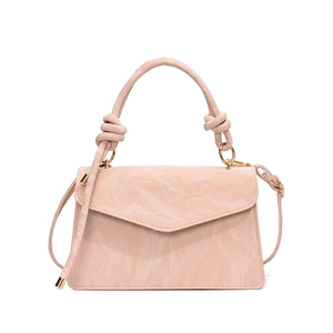 Chic light pink pleated crossbody bag for women with knotted top handle and gold hardware