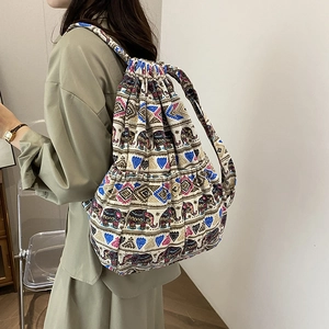 Bohemian style canvas drawstring backpack featuring ethnic elephant and geometric patterns