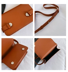Dettaglio della borsa a tracolla in pelle marrone con chiusura magnetica e cinturino