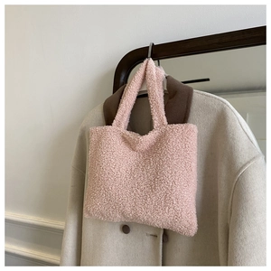 Chic pink sherpa plush tote bag for women featuring soft faux lamb wool texture