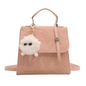 Minimalist peach pink pleated large capacity backpack with silver buckle and plush ball