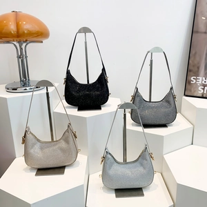 Glittering hobo shoulder bags in silver, gold, and black with adjustable straps