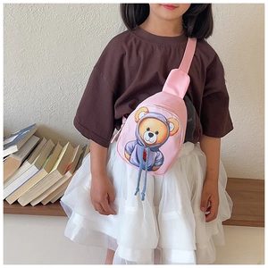 Detail of pink canvas chest bag for kids with cute teddy bear and blue decorative cord