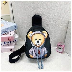Detail of black children's chest bag with cartoon bear print and blue braided drawstring