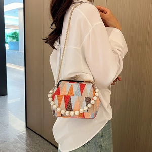 Retro patchwork shell bag with geometric colors, gold chain and pearl handle for women