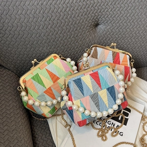 Chic retro shell bags with colorful geometric patterns, pearl handles and chain straps