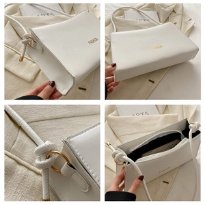 Vues détaillées d'un sac à bandoulière blanc minimaliste avec bandoulière nouée et détails dorés