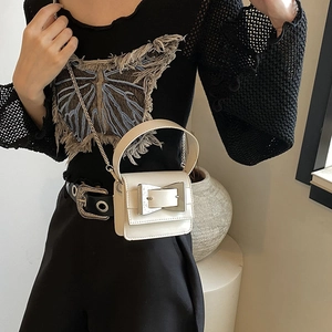 Chic cream mini crossbody bag with silver bow buckle and elegant metal chain strap