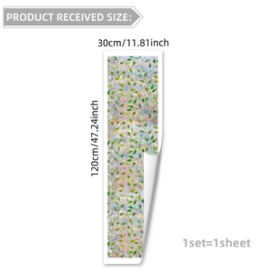 Detail showing the 30x120cm static window film size with floral vine and green leaf pattern