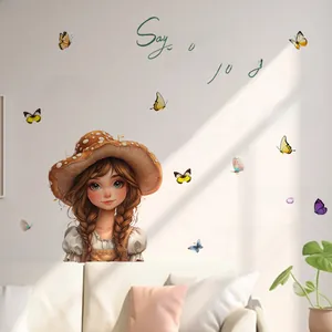 Detail of cute girl wall sticker with colorful butterflies and inspirational text quotes