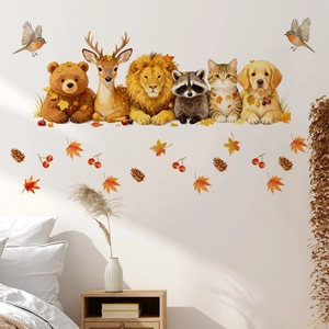 Detailed view of watercolor forest animals and maple leaf wall decals in a bedroom