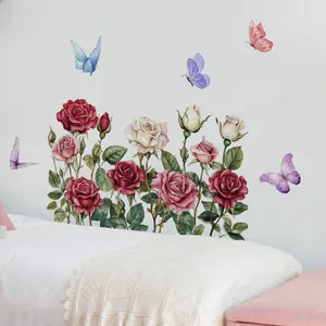 Detail of floral wall stickers with watercolor roses and butterflies in a bedroom setting