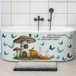 Détail d'autocollants lapin et champignon sur une baignoire en céramique blanche de bain