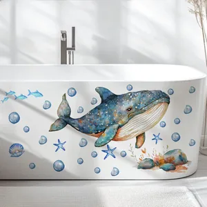Detailed watercolor whale and coral wall decals on a white modern bathtub surface