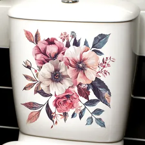 Close-up of realistic vintage floral stickers on a white ceramic bathroom surface