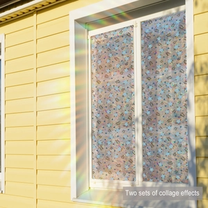 Detail of floral rainbow window film showing blue flowers and iridescent sunlight prism effect