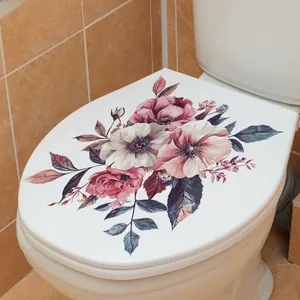 Detail of floral PVC toilet seat sticker with pink roses on a standard bathroom cover