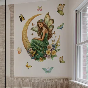 Detail of cute cartoon fairy sitting on a golden moon wall sticker for bathroom decor