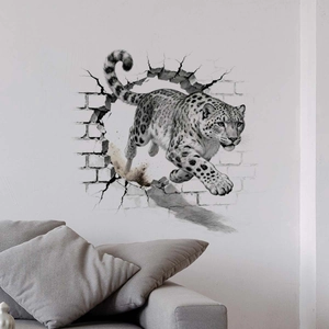 Sticker mural 3D montrant un léopard des neiges réaliste traversant un mur de briques
