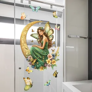 Detail of angel fairy on crescent moon wall sticker with colorful butterflies on glass