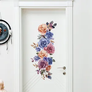 Detail of artistic watercolor floral wall sticker on a white door in a modern home