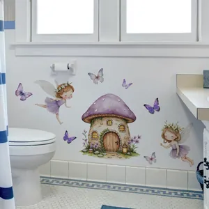 Detail of cartoon fairy and purple mushroom wall stickers applied on white bathroom wall